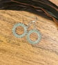 Beadwork hoop earrings in pale green and silver - Image 1