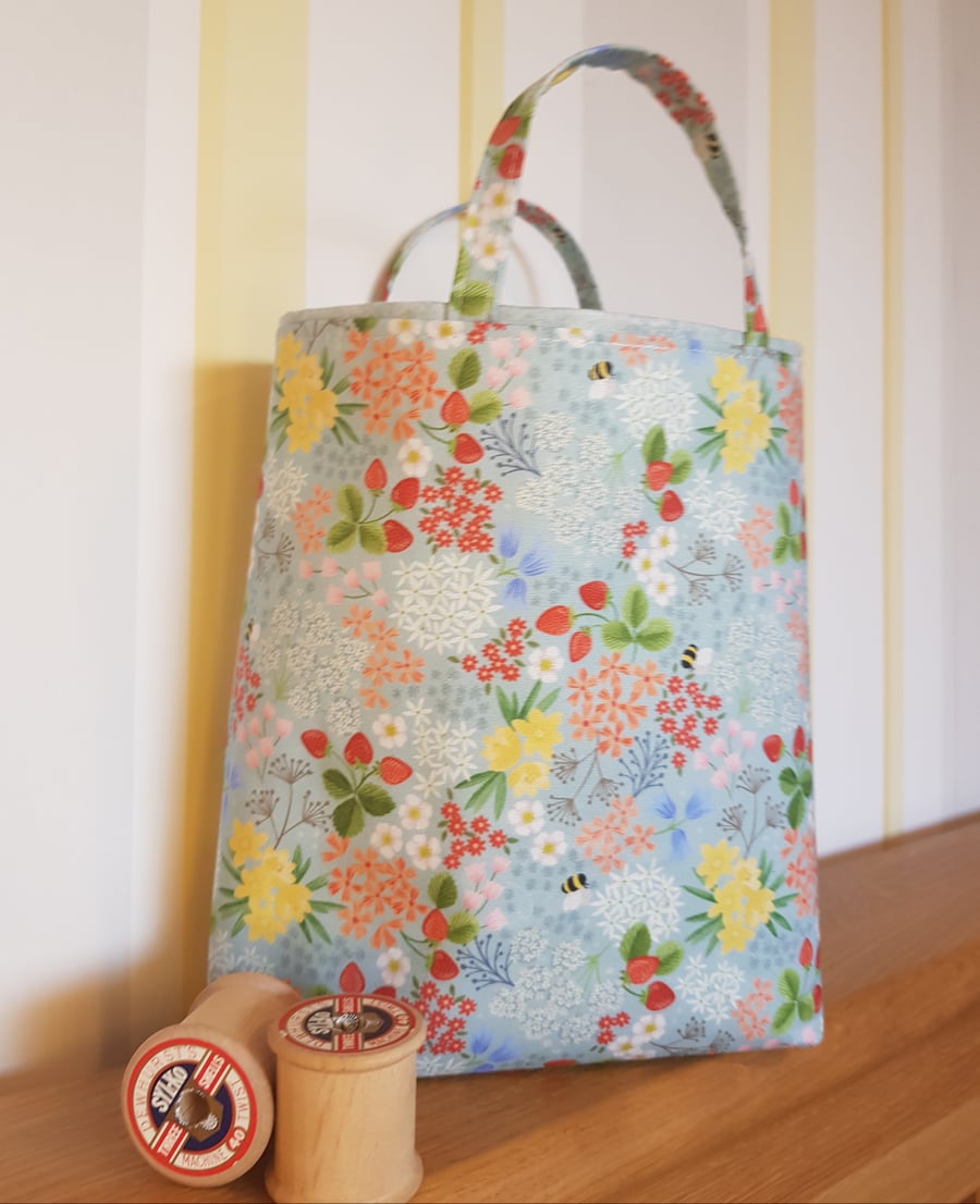 Reusable fabric gift bag: flowers and wild strawberries 