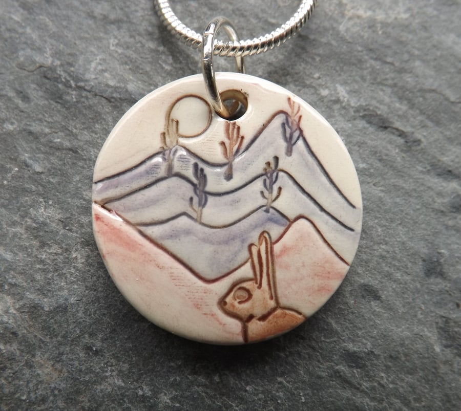 Handmade Ceramic Hare pendant in lavendar and rose