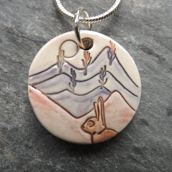 Handmade Ceramic Hare pendant in lavendar and rose