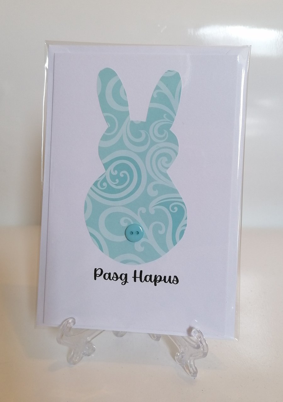 Pasg Hapus Happy Easter turquoise swirls rabbit with button tail greetings card 