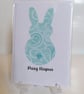 Pasg Hapus Happy Easter turquoise swirls rabbit with button tail greetings card  - Image 1