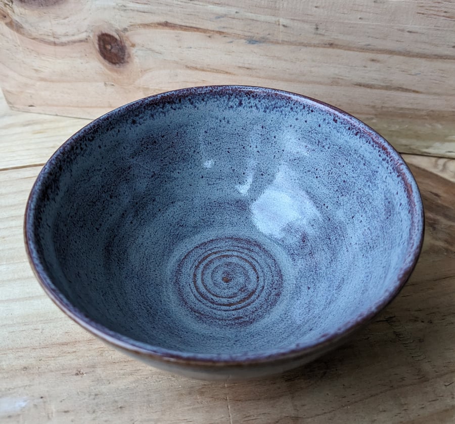 Purply red speckled bowl