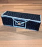 Pencil case with lid and gold button closure - black and grey with white edging - Image 1
