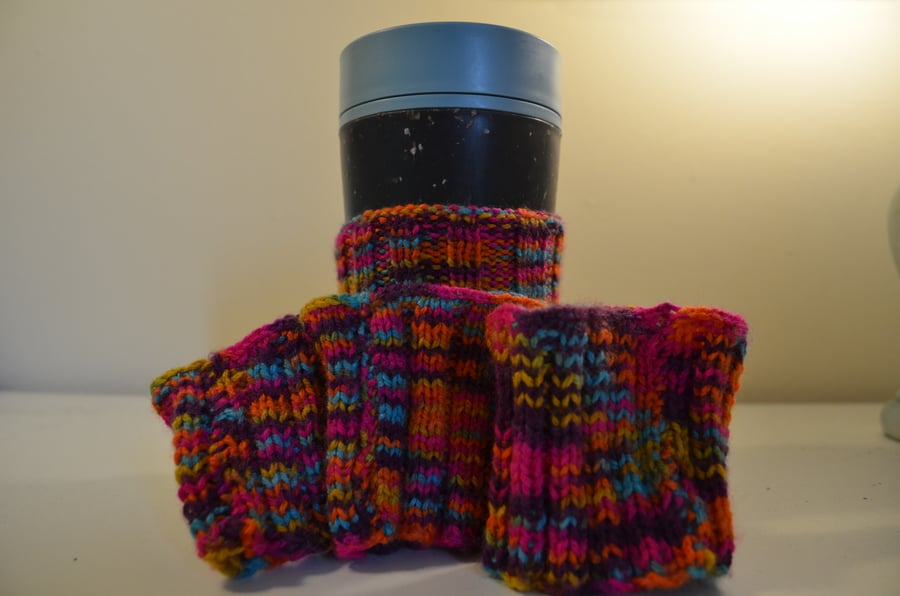 Vibrant multicoloured vertical stripe cup cosies