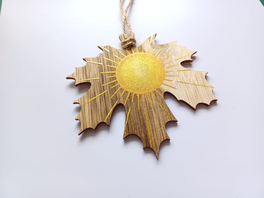 Gold Sun maple leaf Wooden maple leaf with sun image painted in metallic paints