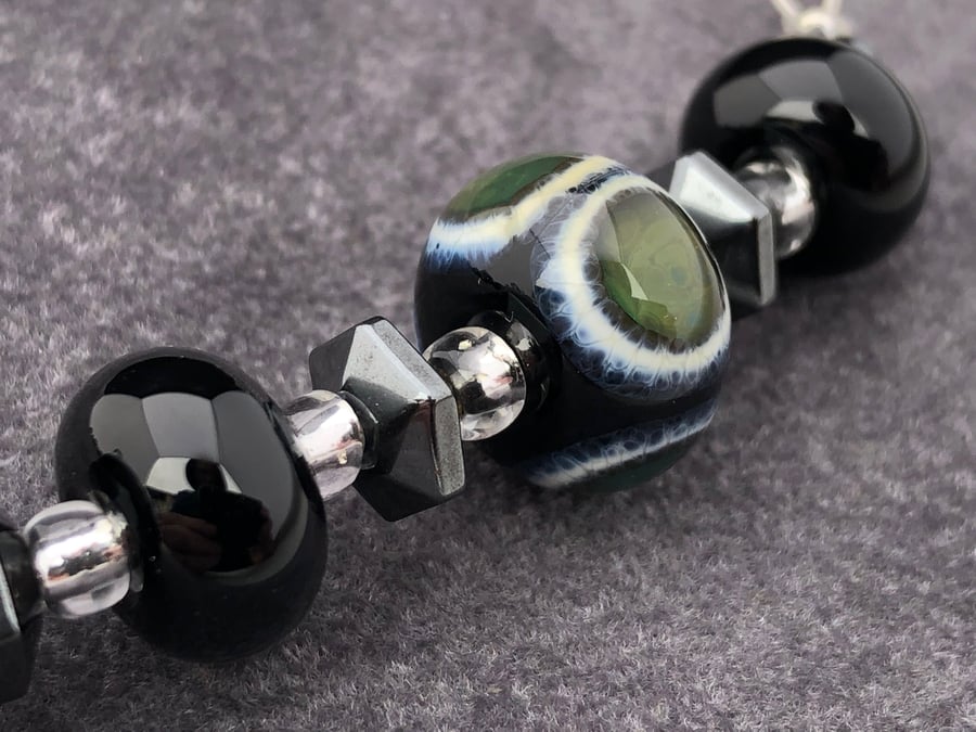 black, green and ivory cream spotted lampwork glass and haematite bead necklace