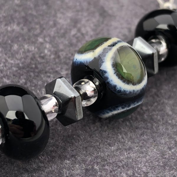 black, green and ivory cream spotted lampwork glass and haematite bead necklace