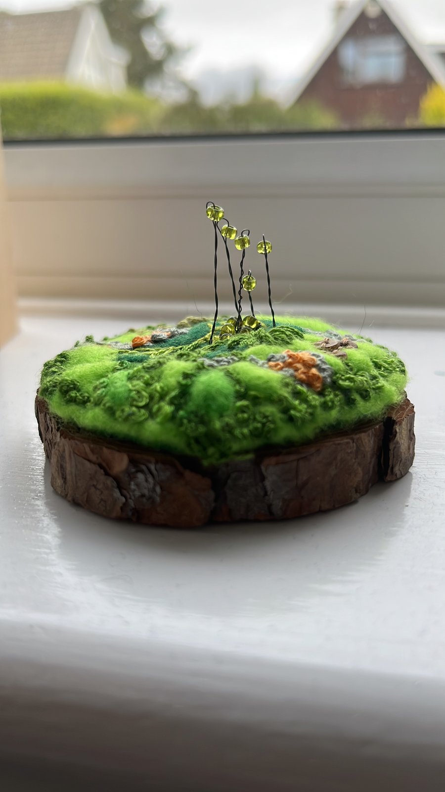 Embroidered moss ornament 