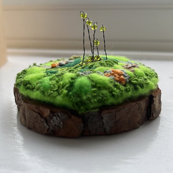 Embroidered moss ornament 