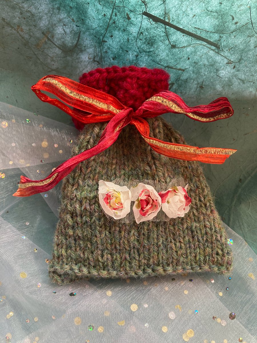 Gift bag knitted in woodland green and raspberry pure new wool