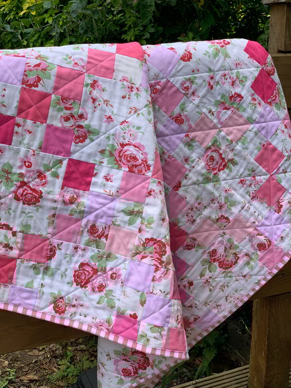 Pink and white baby quilt