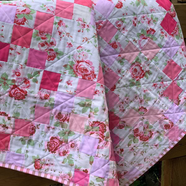 Pink and white baby quilt