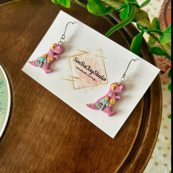 Floral dinosaurs polymer clay dangle earrings 