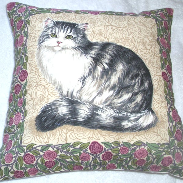 A very pretty fluffy grey tabby and white cat cushion