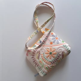  Handbag upcycled in embroidered and padded fabric. 