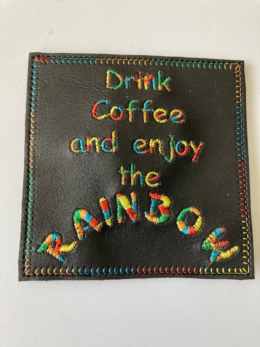 616. Drink coffee and enjoy the rainbow coaster.