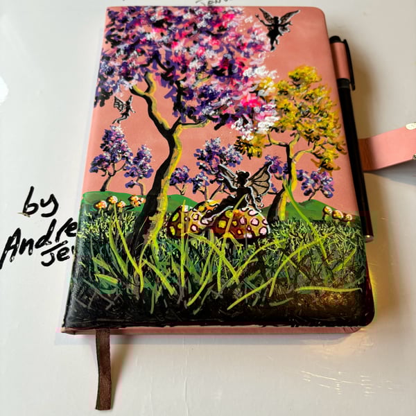 A hand painted and sealed faux leather journal by Andrew Jenkins 