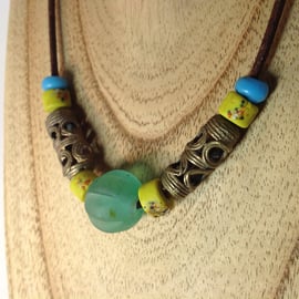 Unisex cord necklace with beads from around the world