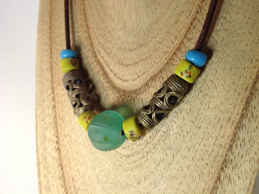 Unisex cord necklace with beads from around the world