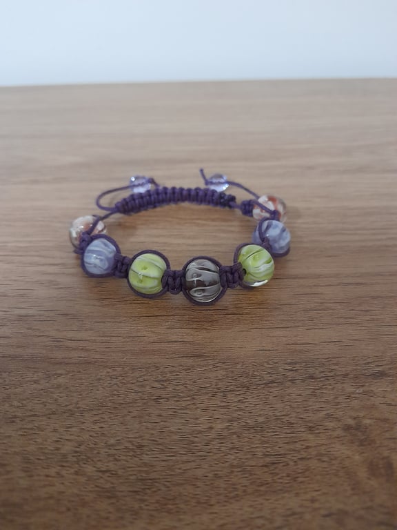 SHADES OF PURPLE, PINK AND LIME MACRAME BEADED BRACELET.