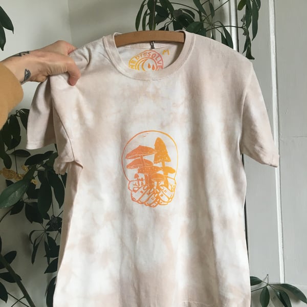 Tie dyed, plant dyed peachy organic cotton t-shirt with mushroom linocut print.