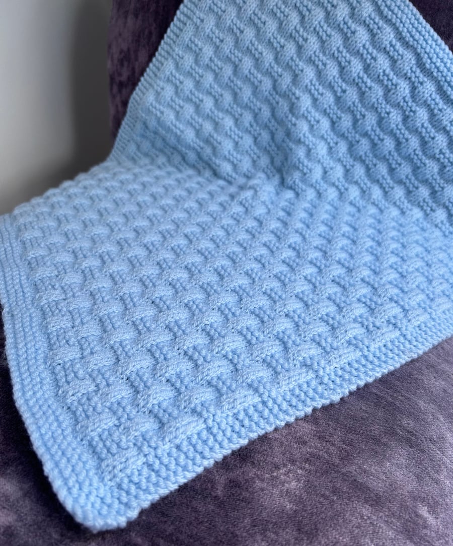 Baby Blanket in a powder blue basket weave pattern 