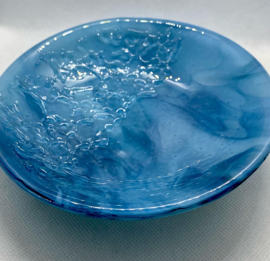 Bowl made from powder blue and marine blue streaked glass