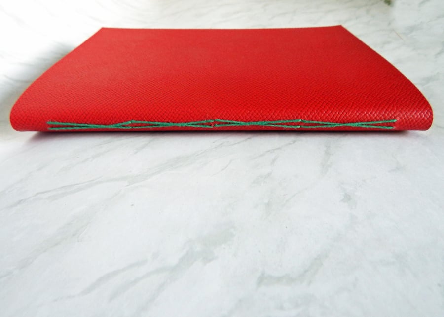 Red Leather Notebook, Journal. Criss-cross leather cover & cream lined pages. 