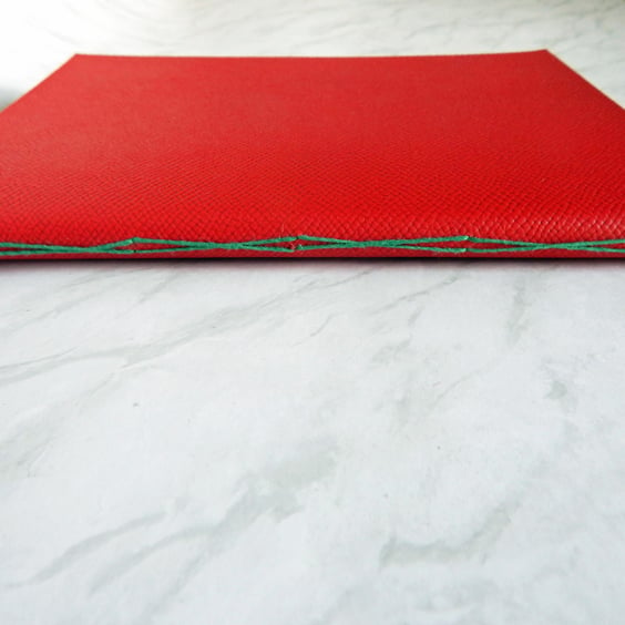 Red Leather Notebook, Journal. Criss-cross leather cover & cream lined pages. 