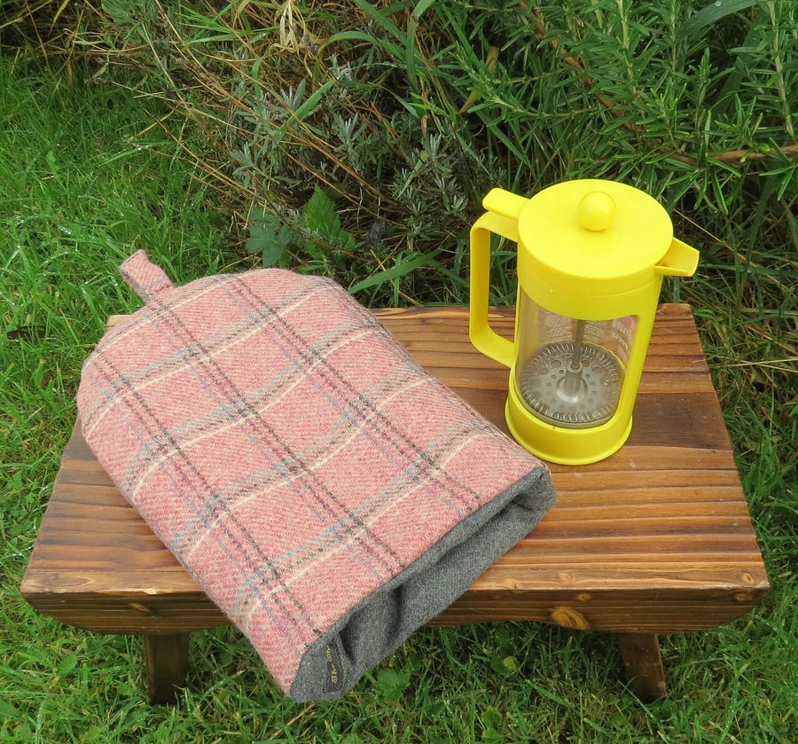 A cafetiere cosy, made from a tartan wool. Size small, to fit a 2 cup cafetiere.