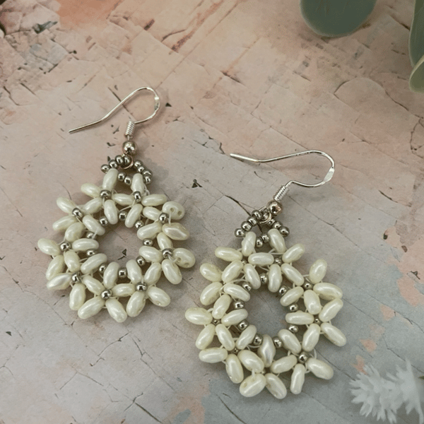 Daisy design hand crafted beaded hoop dangle earrings , statement jewelery