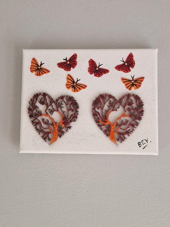 Delicate trees and butterflies. 