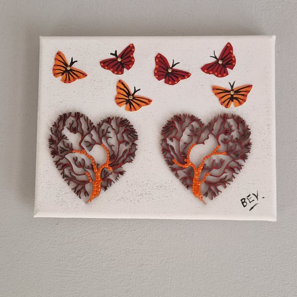 Delicate trees and butterflies. 