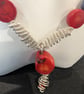 Red Bamboo Coral Pendant complimented by wire wrapped beads - Image 3