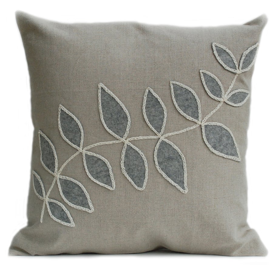 Linen cushion with grey leaf design