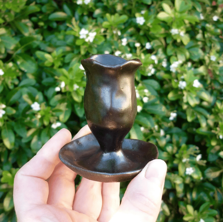 rustic little black and dark brown hand built candle holder