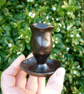 rustic little black and dark brown hand built candle holder