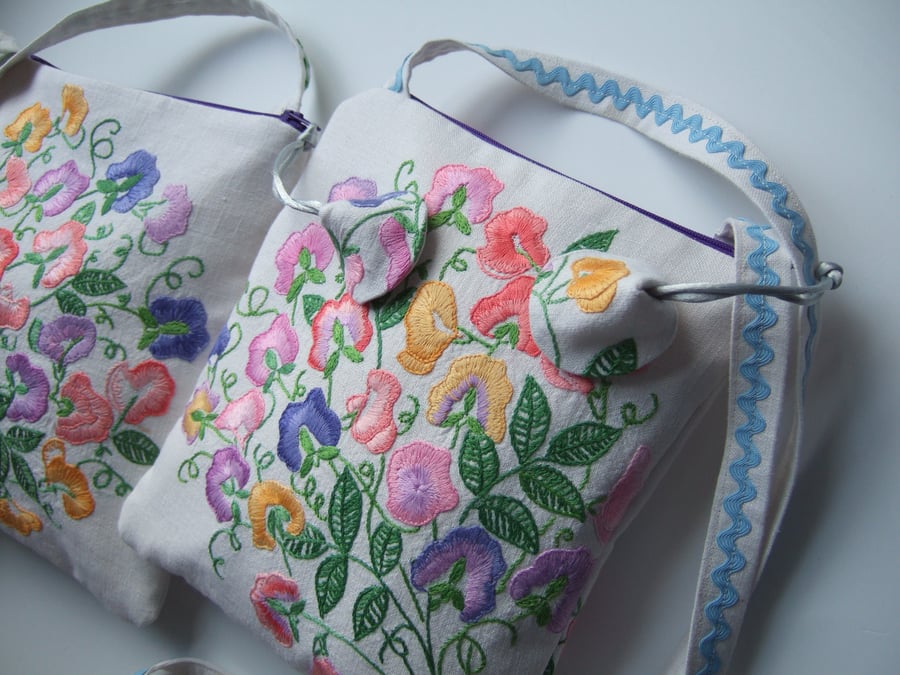 Sweet pea vintage embroidery across your body occasions bag.
