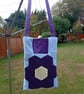 Patchwork peg bag with shoulder strap. Purple, yellow & blue with white spots. 