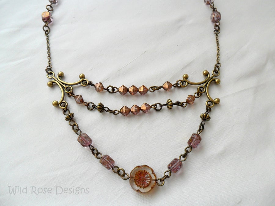 Three row purple and bronze necklace
