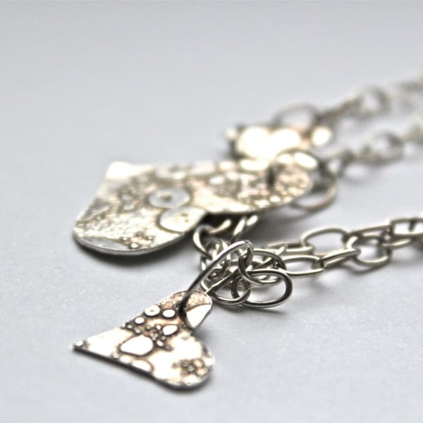 Silver Dangling Hearts Necklace