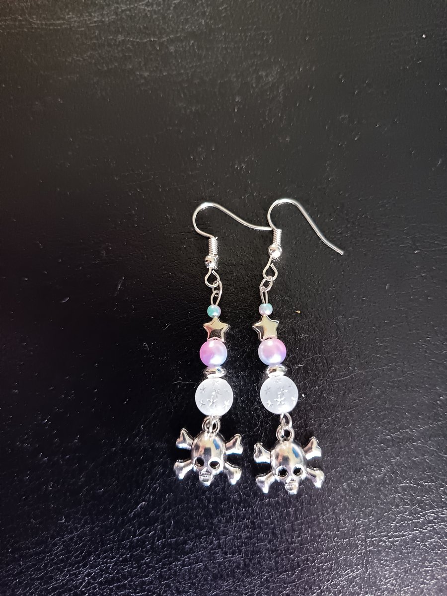 Silver skull and crossbones dangle earrings with pastel and star beads