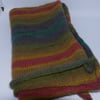 Hand knitted multicoloured simple striped winter scarf
