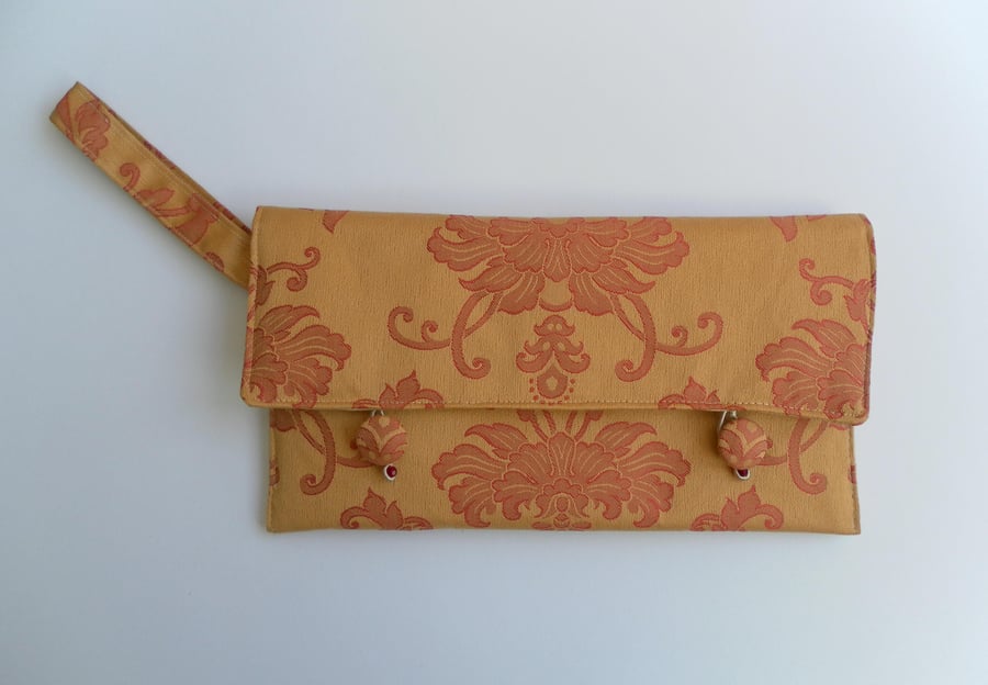 Large Clutch Bag with Wrist Strap, Gold with Red Design