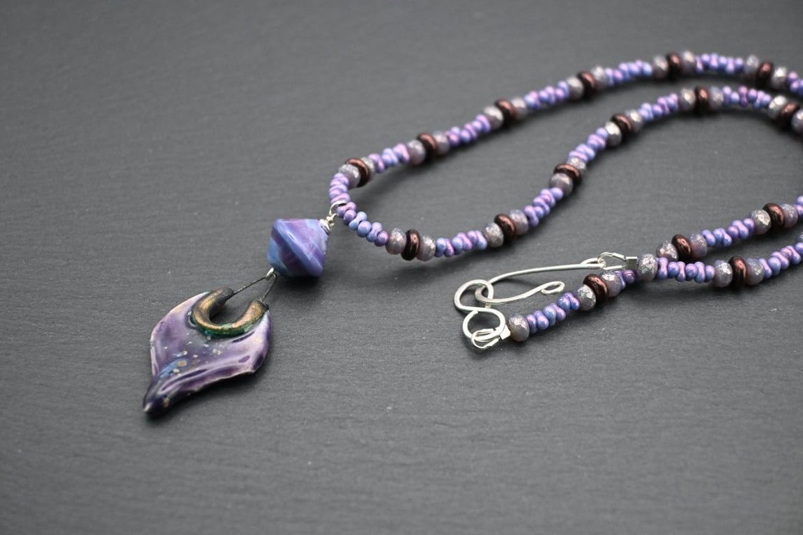 purple lampwork glass and ceramic pendant necklace