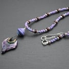 purple lampwork glass and ceramic pendant necklace