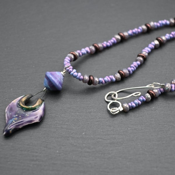 purple lampwork glass and ceramic pendant necklace
