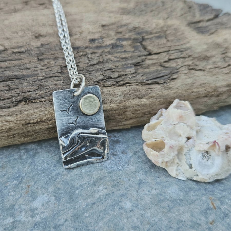 Silver beach, sea coast pendant, with brass sun and seagulls