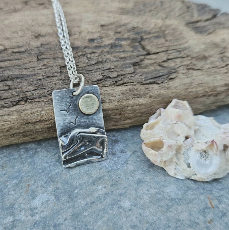 Silver beach, sea coast pendant, with brass sun and seagulls